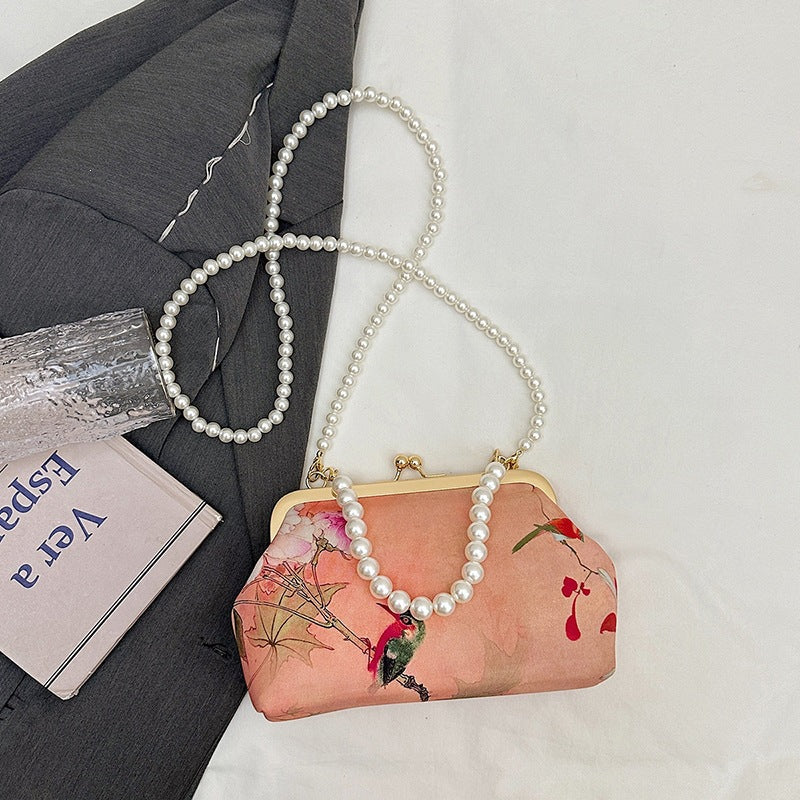 Damen elegante Handtasche mit zartem Blumendruck und Perlenkette Nord Taschen