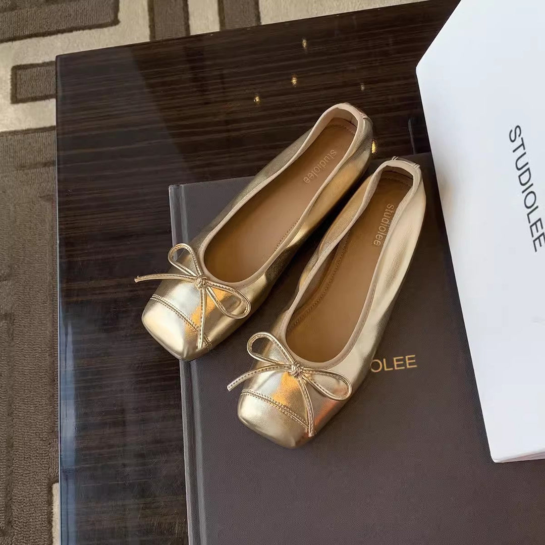 Damen elegante Ballerinas mit Schleifendetail und glänzender Schuhspitze