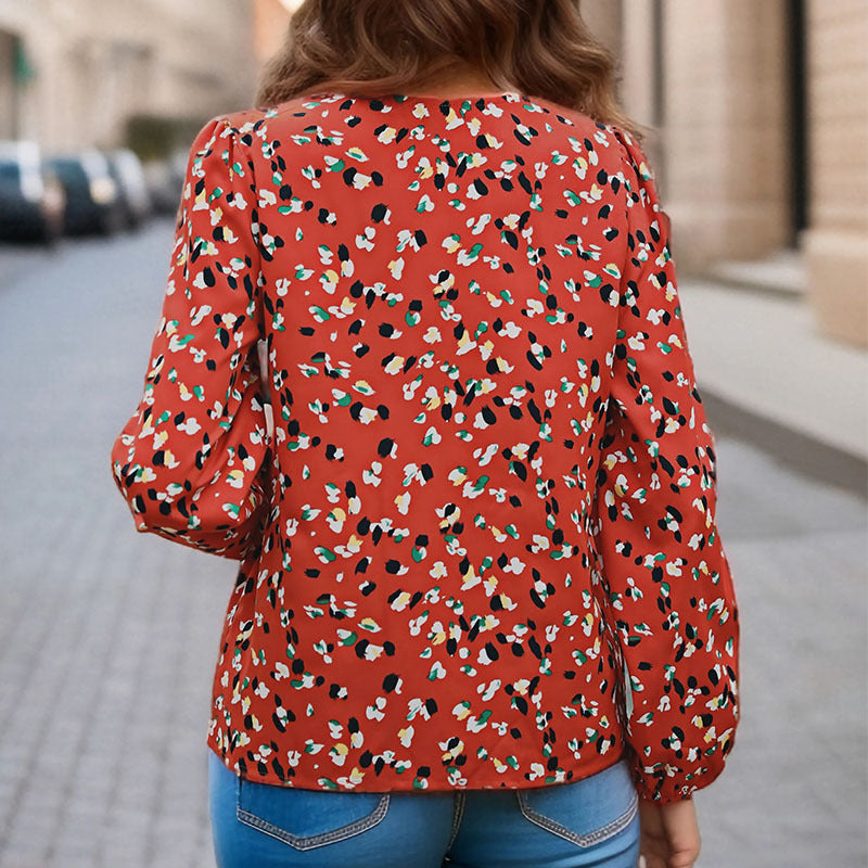 Damen Locker geschnittene V-Ausschnitt-Bluse mit kontrastierter Zierblende und Allover-Print Nord Taschen