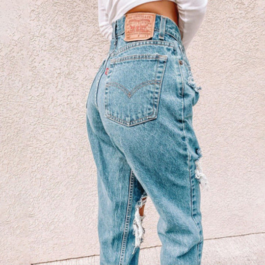 Damen Vintage High-Waist Destroyed Jeans mit fransigen Details
