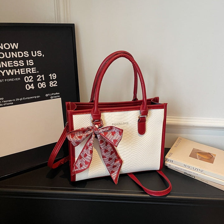 Damen stilvolle Handtasche mit dekorativem Schleifendetail Nord Taschen