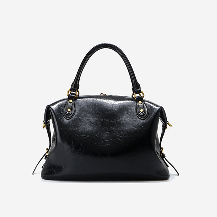 Damen elegante Handtasche mit goldenen Details Nord Taschen