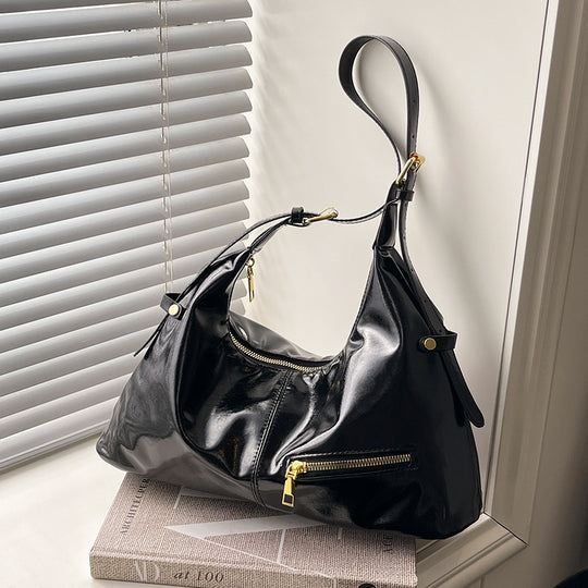 Damen Hobo-Tasche mit glänzender Oberfläche und praktischen Reißverschlusstaschen Nord Taschen