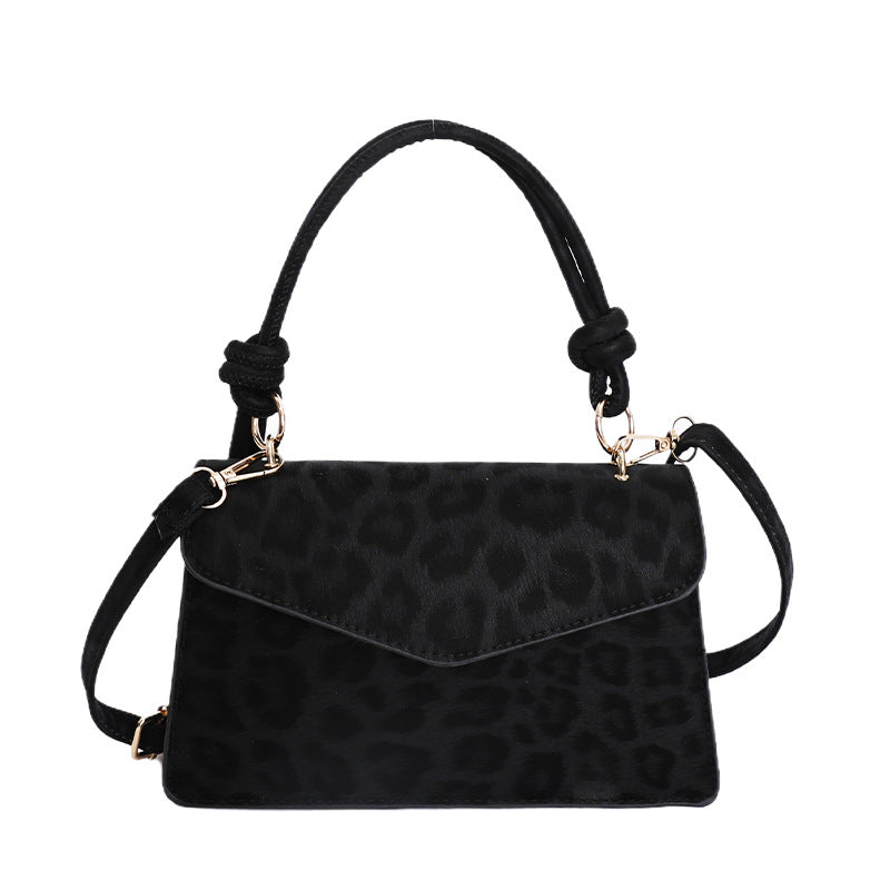 Damen Umhängetasche mit eleganter Leo-Prägung und abnehmbarem Schulterriemen Nord Taschen