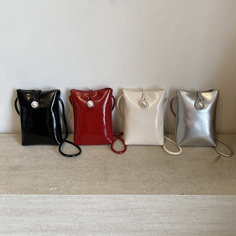 Damen elegante Clutch mit Perlenakzent Nord Taschen