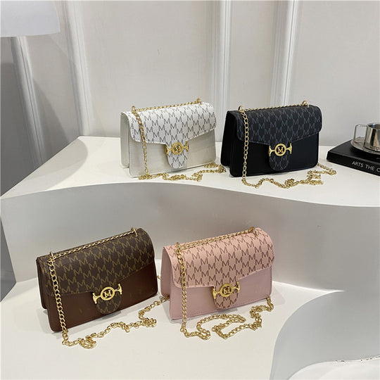Damen Umhängetasche mit goldener Kettenverzierung und Designer-Logo Nord Taschen