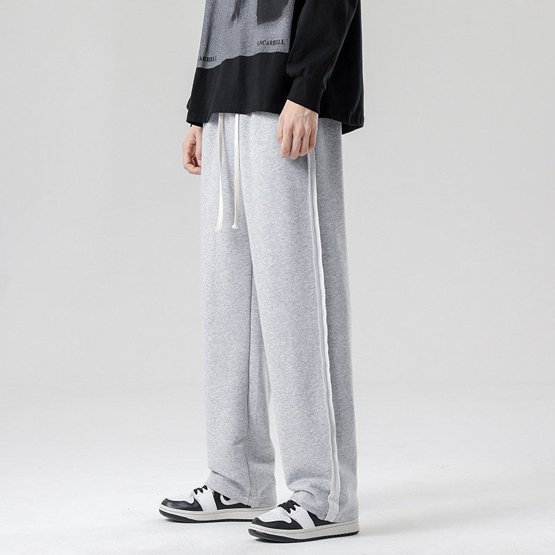 Herren weite Jogginghose im Oversize-Schnitt mit Seitenstreifen, Kordelzug & Fleecefutter Nord Taschen