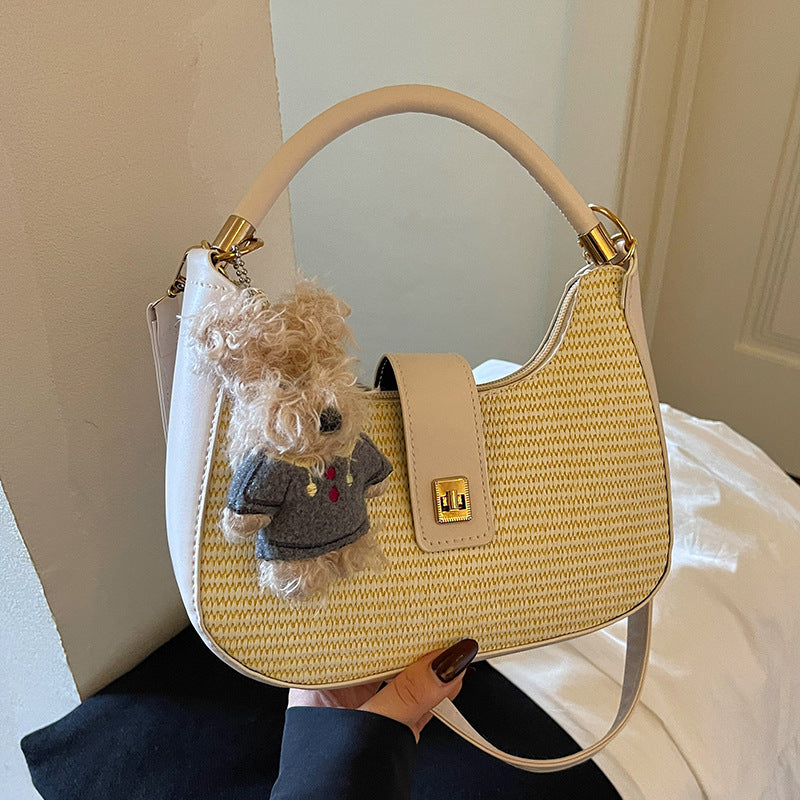 Damen Handtasche mit raffiniertem geflochtenem Design und verspieltem Anhänger Nord Taschen