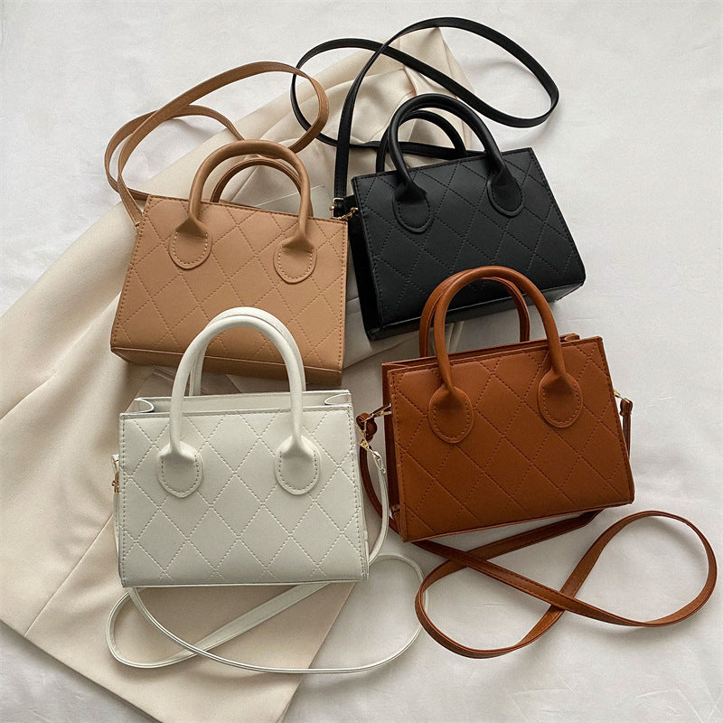 Damen stilvolle und strukturierte Handtasche mit trendiger Steppung Nord Taschen