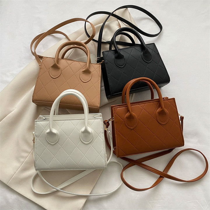 Damen stilvolle und strukturierte Handtasche mit trendiger Steppung Nord Taschen