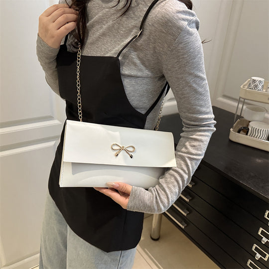 Damen elegante Clutch im minimalistischen Design mit goldenen Akzenten Nord Taschen