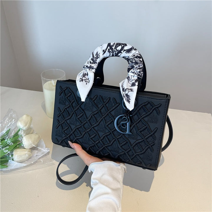 Damen elegante Handtasche mit strukturiertem Design und modischem Halsschal Nord Taschen