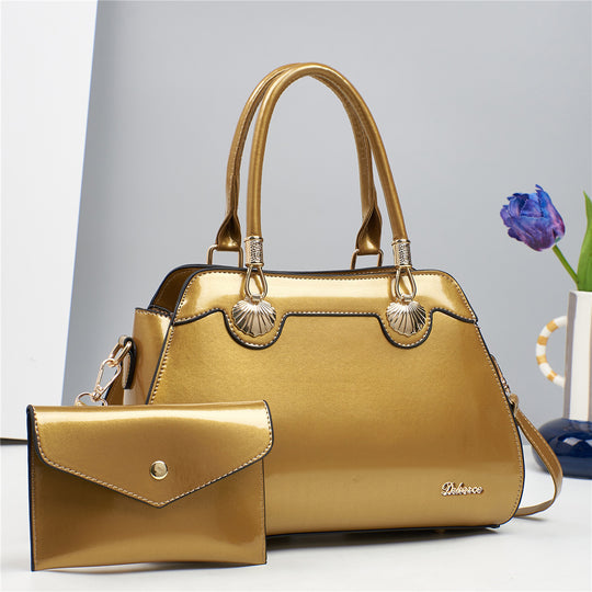 Damen Handtasche mit eleganten Goldakzenten und abnehmbarer Mini-Clutch Nord Taschen