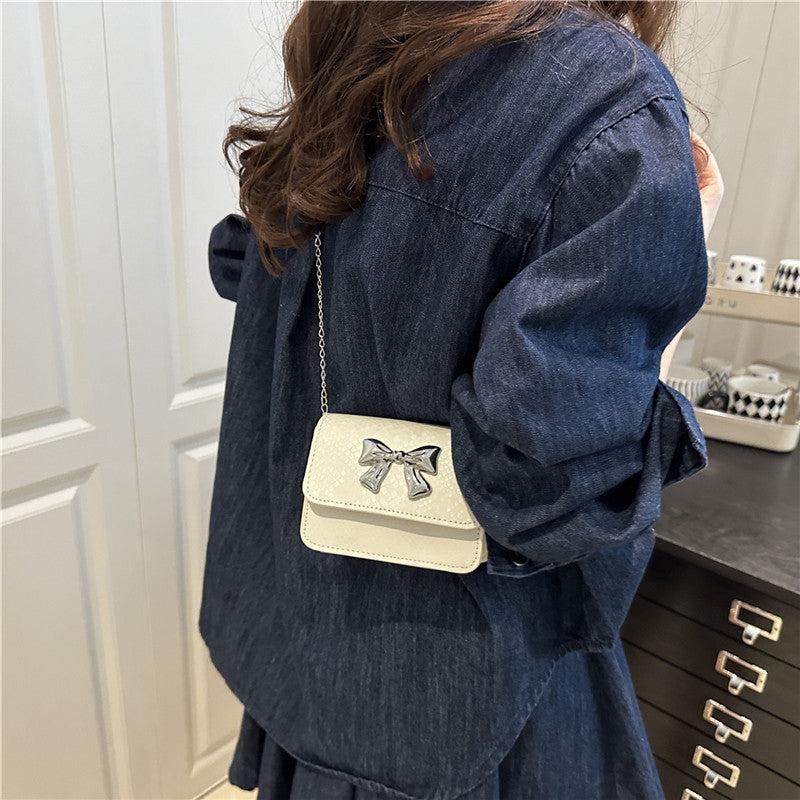 Damen Clutch mit verspieltem Schleifendesign Nord Taschen