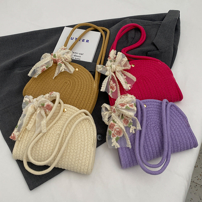 Damen Handtasche mit floralem Dekor und geflochtenem Design Nord Taschen