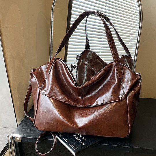 Damen Hobo-Tasche mit modischer Falten-Optik und strukturierten Akzenten Nord Taschen