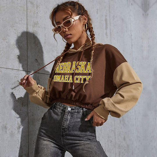 Damen Cropped Hoodie mit Kontrastärmeln, elastischem Saum und schmelzendem Smiley-Print Nord Taschen
