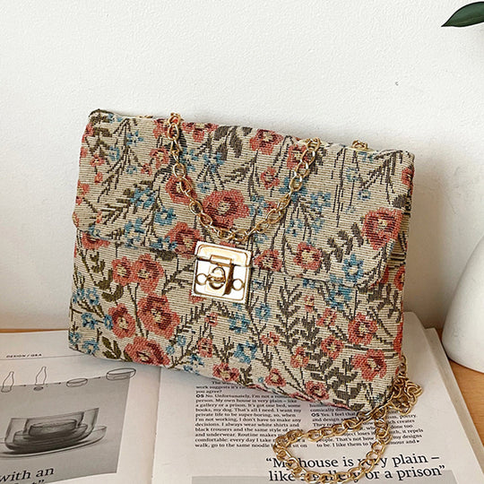 Damen Clutch-Tasche mit floralem Stoffdesign und goldener Kettenverzierung Nord Taschen