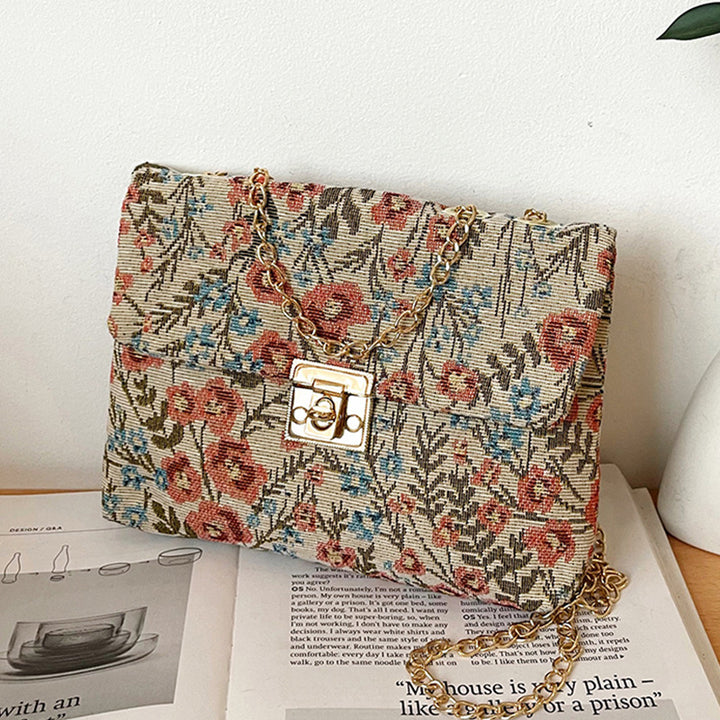 Damen Clutch-Tasche mit floralem Stoffdesign und goldener Kettenverzierung Nord Taschen