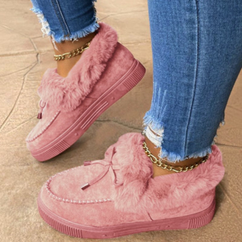 Damen Kuschel‑Mokassin‑Slipper mit hochfloriger Fellmanschette, dekorativer Steppnaht und leichtem Plateau‑Sohlenprofil Nord Taschen