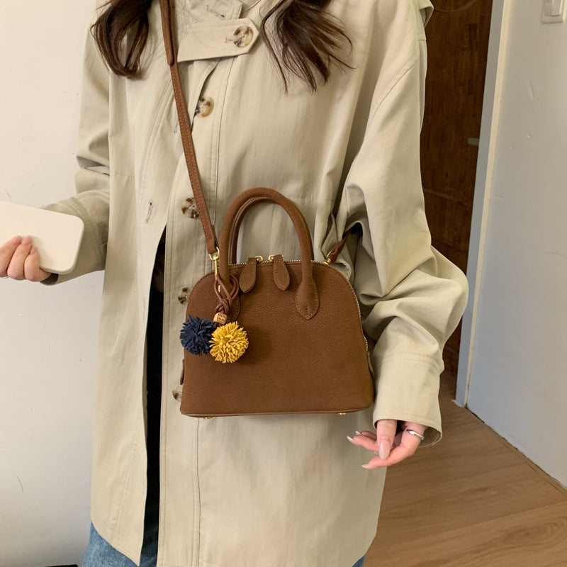 Damen Handtasche mit eleganten Quasten Nord Taschen