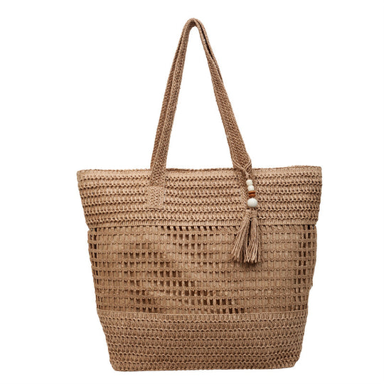 Damen elegante Strandtasche mit ausgefallenem Häkel-Design und dekorativen Quasten Nord Taschen
