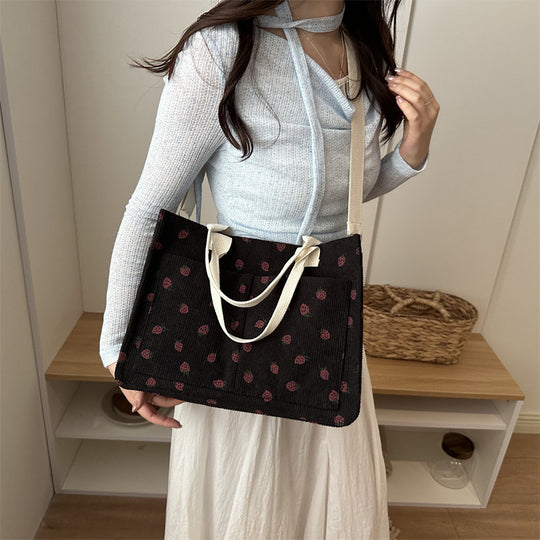 Damen Umhängetasche mit fröhlichem Erdbeerprint und praktischen Fächern Nord Taschen