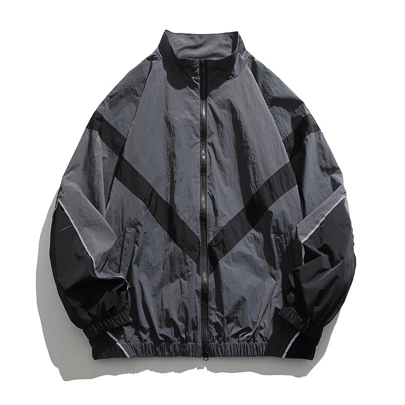 [Unisex] Oversize technische Wind- und Regenjacke mit Stehkragen, reflektierenden Paspeln und elastischem Saum Nord Taschen
