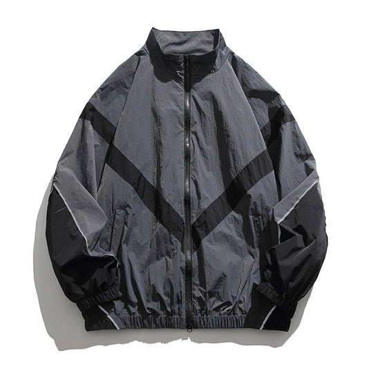 [Unisex] Oversize technische Wind- und Regenjacke mit Stehkragen, reflektierenden Paspeln und elastischem Saum Nord Taschen