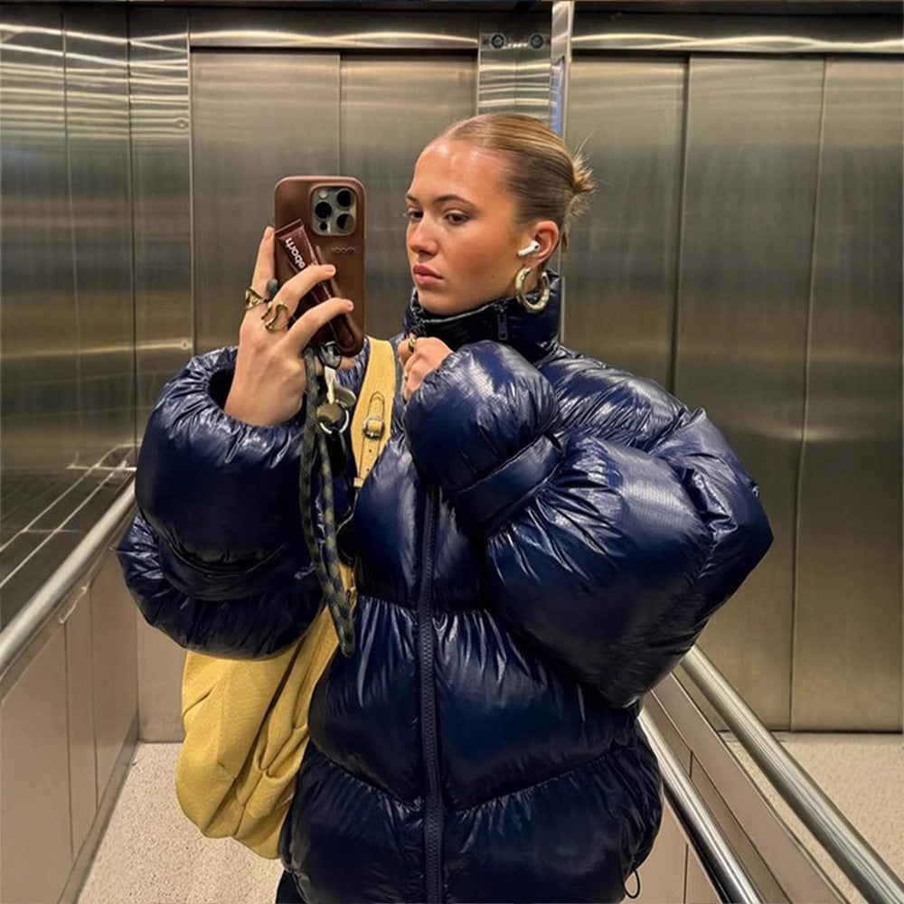 Damen Glänzende Oversize-Steppjacke mit Kapuze und hohem Stehkragen Nord Taschen