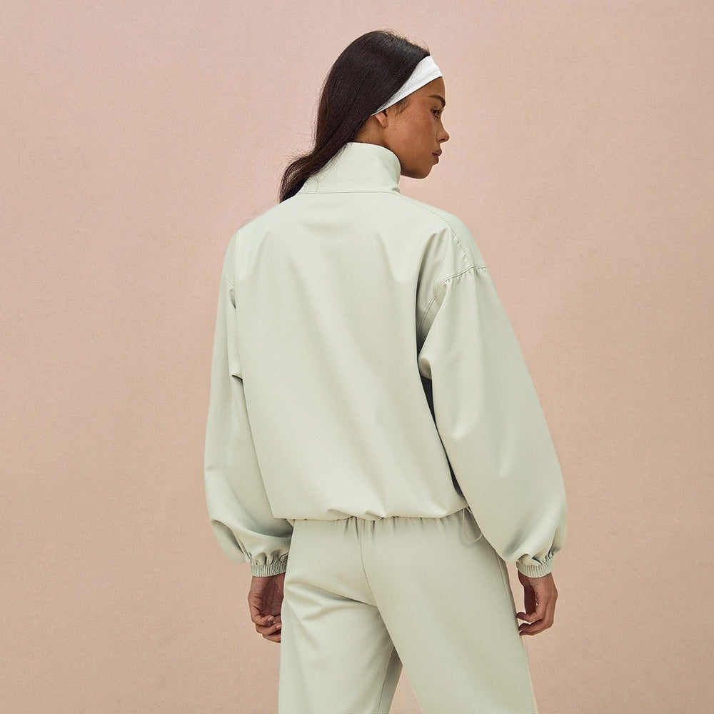 Damen Oversize-Trainingsset mit Stehkragen Ballonärmeln und weiten Kordelhosen Nord Taschen