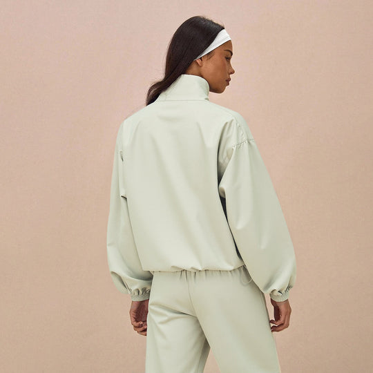 Damen Oversize-Trainingsset mit Stehkragen Ballonärmeln und weiten Kordelhosen Nord Taschen