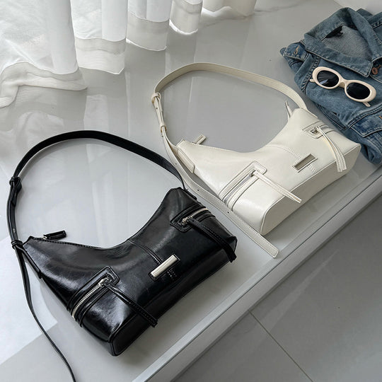 Damen modische Schultertasche aus glänzendem Kunstleder mit praktischen Reißverschlusstaschen Nord Taschen