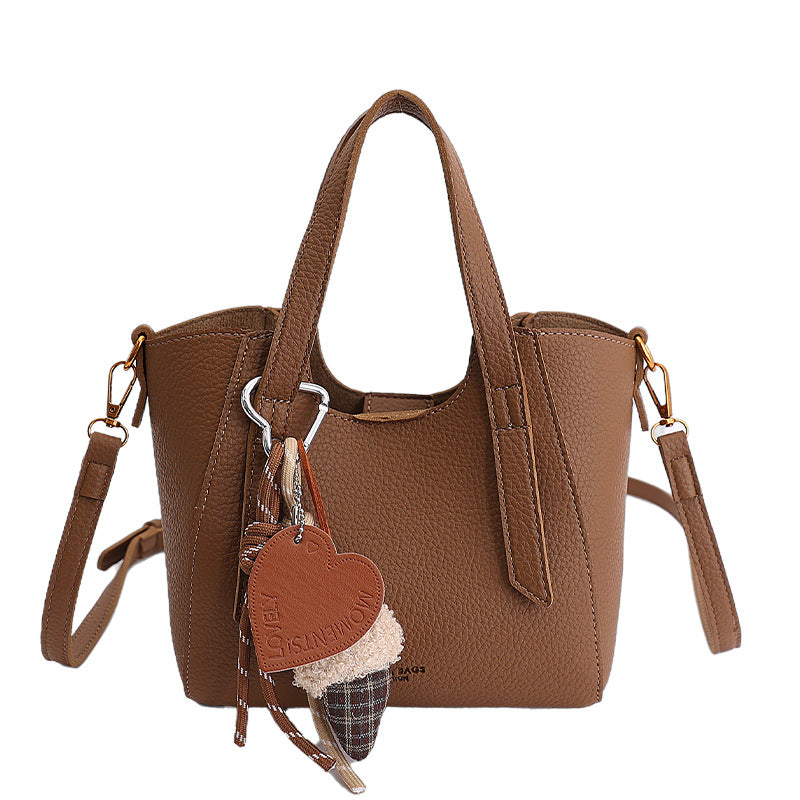Damen Mini-Handtasche im eleganten Design mit charmantem Anhänger Nord Taschen