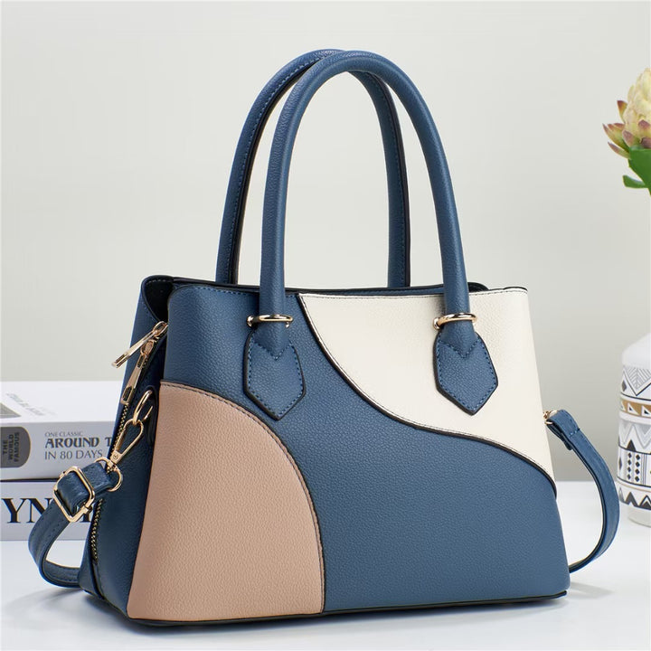 Damen Handtasche mit kreativem Farbdesign und verstellbarem Schulterriemen Nord Taschen