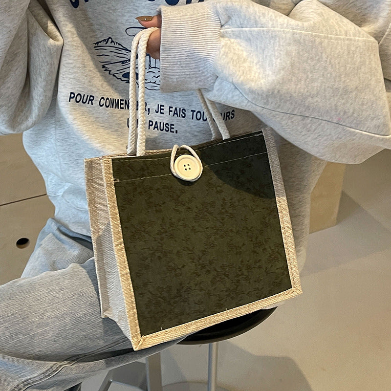 Damen Handtasche mit floralem Design und robusten Griffen Nord Taschen
