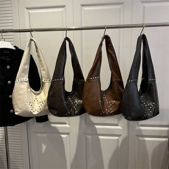 Damen Hobo-Tasche mit eleganter Sternenverzierung und strukturiertem Kunstleder Nord Taschen