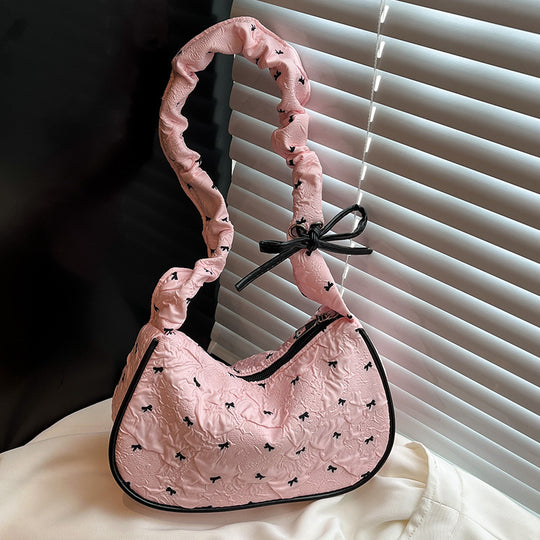 Damen Umhängetasche mit innovativer Schulterriemenstruktur und floralem Design Nord Taschen
