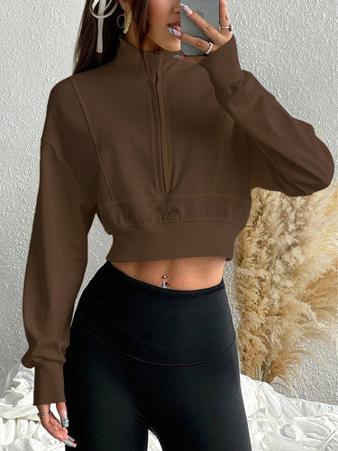 Damen kurzes Stehkragen-Sweatshirt mit halbem Reißverschluss, tailliertem Rippenbund und Daumenloch-Ärmeln Nord Taschen