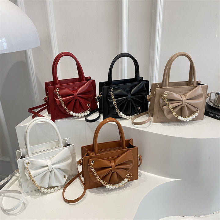 Damen elegante Handtasche mit Schleifenakzent und Perlenverzierung Nord Taschen