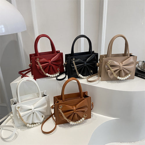 Damen elegante Handtasche mit Schleifenakzent und Perlenverzierung Nord Taschen