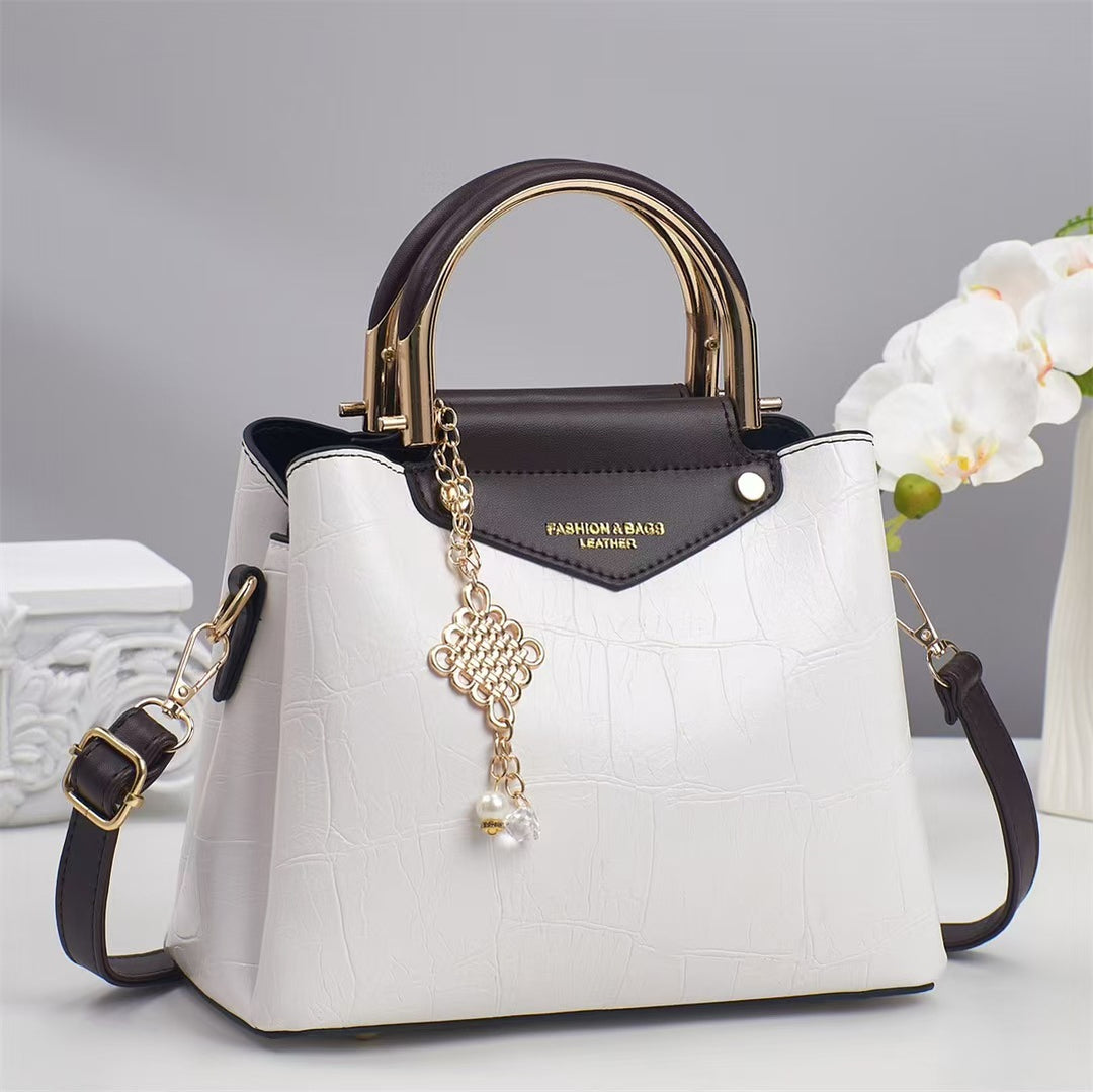 Damen elegante Handtasche mit goldenen Akzenten Nord Taschen