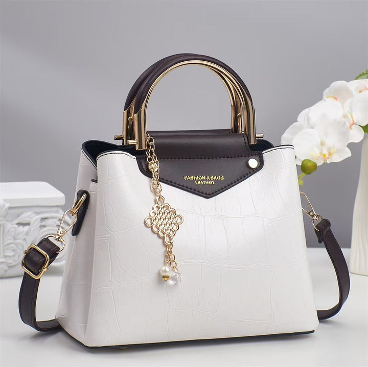 Damen elegante Handtasche mit goldenen Akzenten Nord Taschen