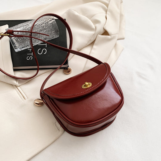 Damen Umhängetasche im eleganten Retro-Design mit goldenen Akzenten Nord Taschen