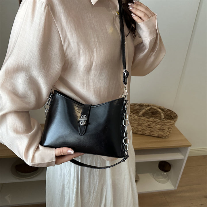Damen elegante Handtasche mit stilvollem Kettenriemen Nord Taschen