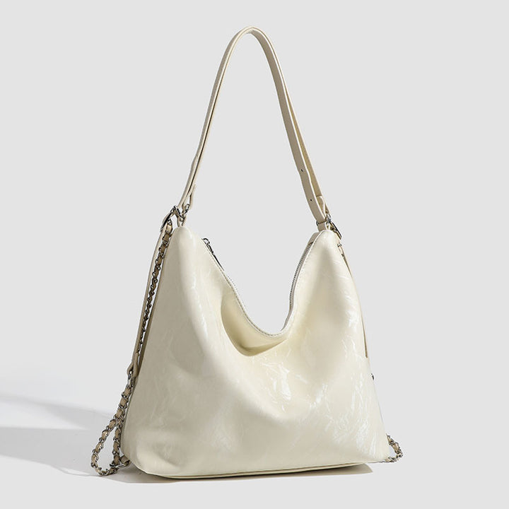 Damen Hobo-Tasche mit großzügigem Innenraum und eleganter Kettenapplikation Nord Taschen