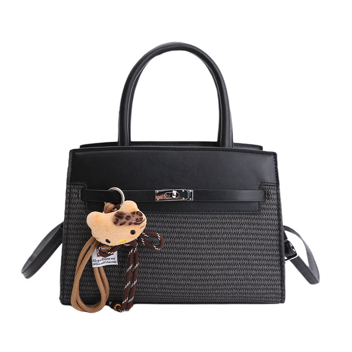 Damen elegante Handtasche mit hochwertigem Strickdesign und charmantem Anhänger Nord Taschen