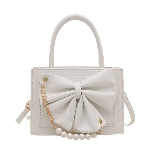 Damen elegante Handtasche mit Schleifenakzent und Perlenverzierung Nord Taschen