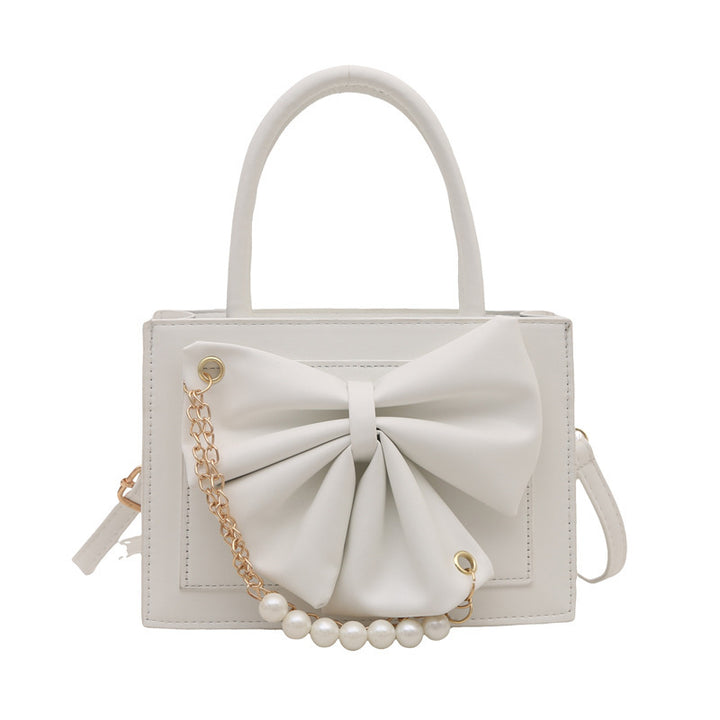 Damen elegante Handtasche mit Schleifenakzent und Perlenverzierung Nord Taschen