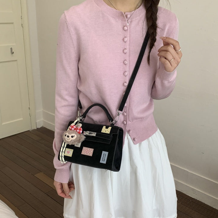 Damenhandtasche mit verspieltem Design und abnehmbarem Anhänger Nord Taschen